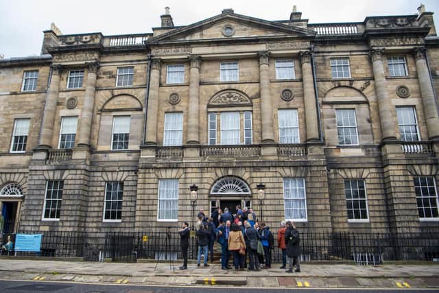 Members of the Media and public gather outside Bute House, the home of the First Minister. Picture: Lisa Ferguson