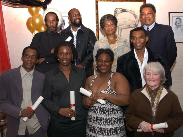Community members are pictured with awards  presented at an event organised by Sheffield Futures to mark Black History Month in 2003