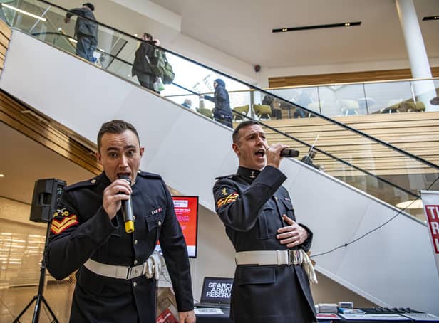25 February 2022.....    Liam Day and Vince Fountain, better known as the Soldiers of Swing, from Britainâ€™s Got Talent performing at Meadowhall Shopping Centre at an event as  the British Heart Foundation, South Yorkshire Police, 4th Infantry Brigade and Reserve Units from South Yorkshire engage with shoppers to raise awareness of heart disease and provide lifesaving training. Picture Tony Johnson