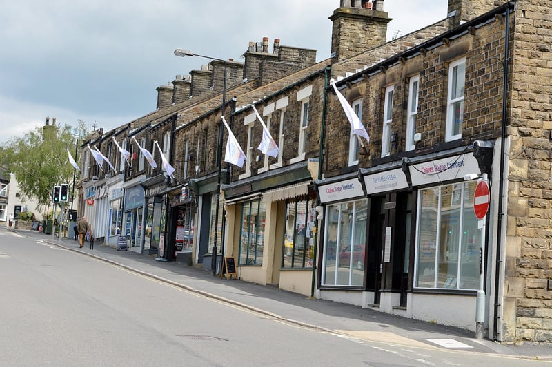 Flags out as shops decorate their windows
