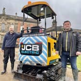 Head Gardener Scott Jamieson at the wheels of the digger loaned by TC Harrison JCB, whose sales director Peter Braybrook is also pictured