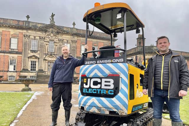 Head Gardener Scott Jamieson at the wheels of the digger loaned by TC Harrison JCB, whose sales director Peter Braybrook is also pictured