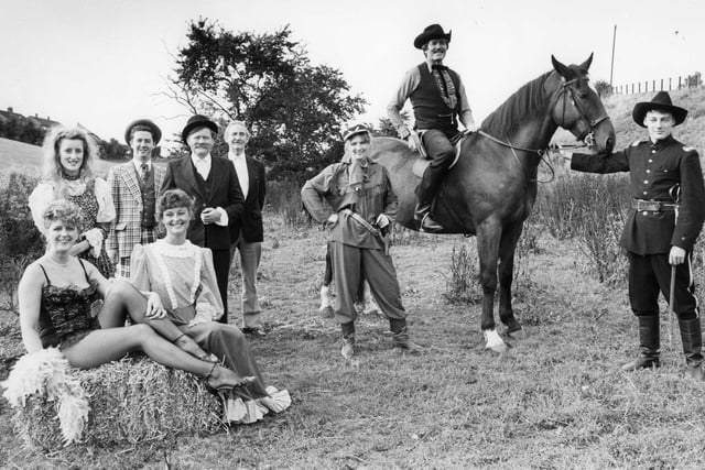 South Shields Amateur Operatic Society members who were performing in Calamity Jane. Pictured left to right are:  Denny Wilson, Lyndsey McCaffery, Helen Lowther, Peter Brack, Alan Greaves, John Ridley, Enid Bilton, Peter Charlton with Lucky, and Lawrence Chadwick.