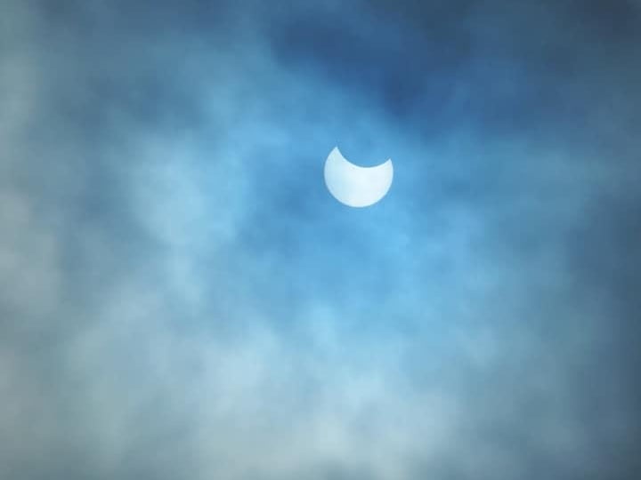 A view of the partial solar eclipse from a home in Morningside, Edinburgh. The spectacle began 45 degrees above the southeastern horizon - so half-way up the sky - and finished 59 degrees up in the south.