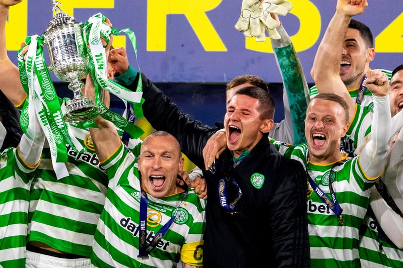 Celtic players celebrate their 2019-20 Scottish Cup success after the delayed final in December