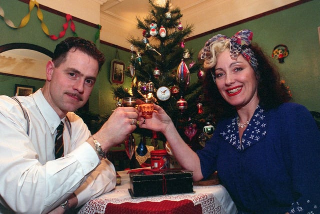 Glenn and Melanie Sanderson pictured with the 1940s Christmas tree at their Norfolk Park home in 1998