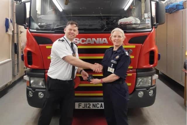 Watch manager Alysson Hill, of Derbyshire Fire and Rescue Service, with station manager Mark Straw. Alyson was airlifted to Sheffield's Northern General Hospital after a horrific crash in which she lost an arm. A fundraising appeal has been set up to support her and her family.