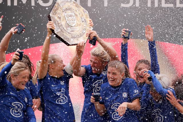 Magdalena Erkisson and Millie Bright of Chelsea lift the Community Shield Trophy following her team's victory on August 29, 2020 in London, England.