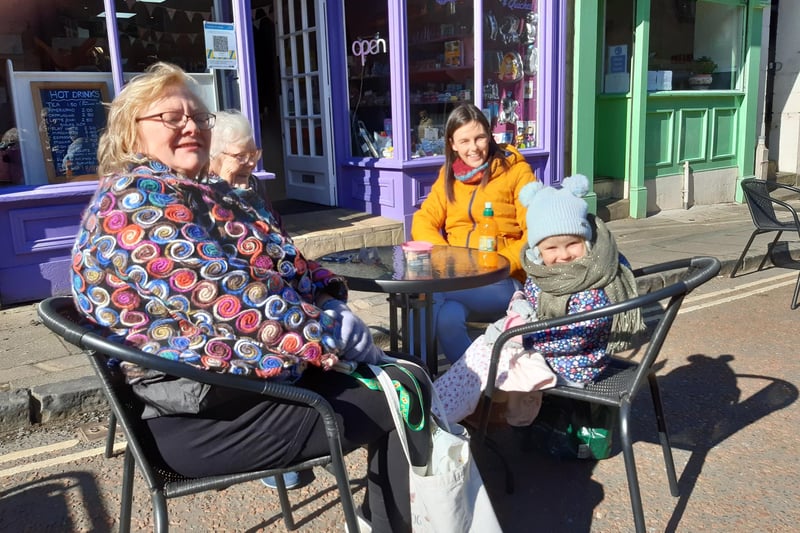 Sheila Young, Barbara Young, Rebecca Tait and Penny Tait sitting outside The Rolling Pin on Narrowgate.