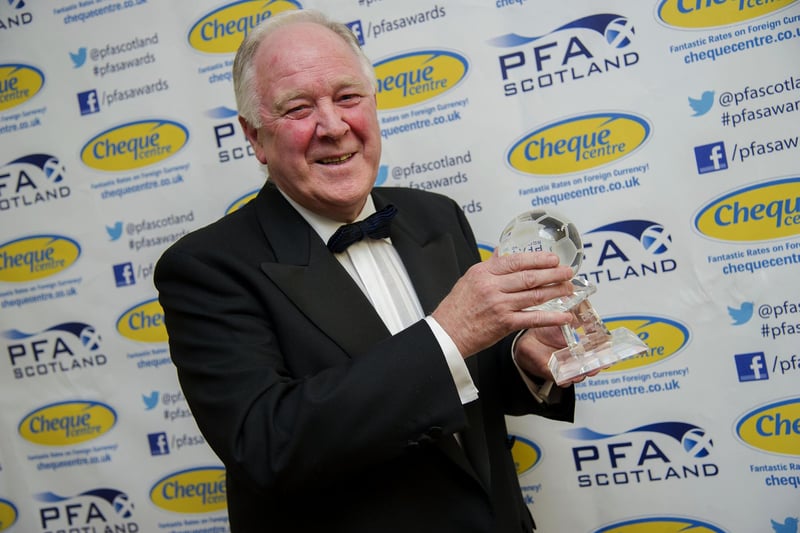 Brown accepts the PFA Scotland Merit Award.