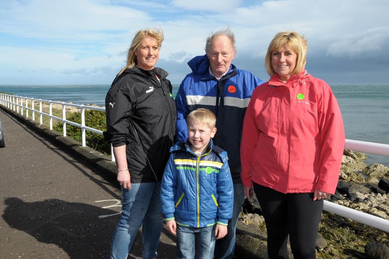 George Bouma with daughters, Rebecca Hobbs and Adelle McKeown and grandson Jack Hobbs on the 2015 Larne walk. INLT 13-230-AM
