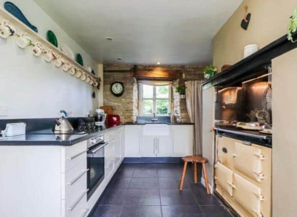This is the kitchen with a very modern design.