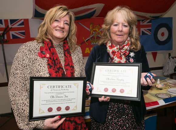 Councillor Denise Fox and Councillor Anne Murphy receive certificates and life time membership of Home Hess.
