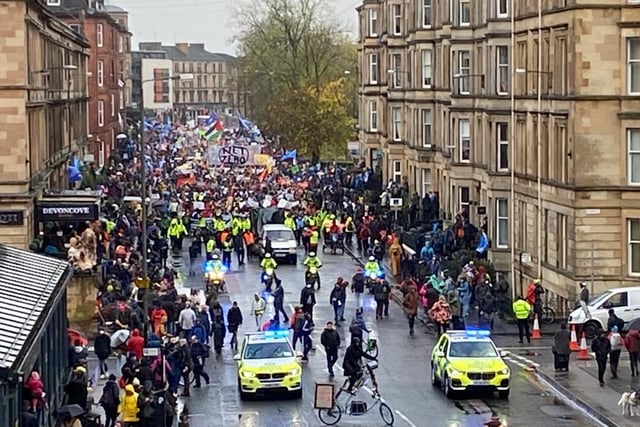 Police officers were trying to maintain control as crowds march through Glasgow streets.