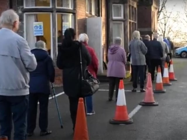 People queue for the coronaviris vaccine in Doncaster