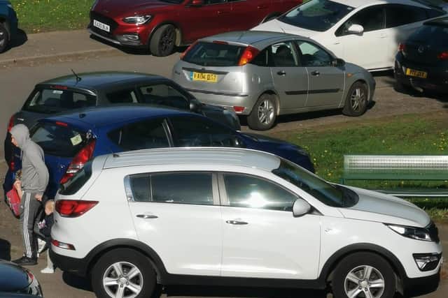 Twice a day during term time, dozens of cars driven by parents arrive on Guildford Rise in Arbourthorne to drop off their children, to the frustration of residents.