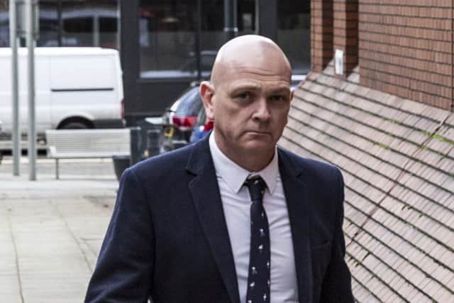 Paul Hinchcliffe, 46, was a serving police officer with South Yorkshire Police when he pulled down an 18-year-old's top and photographed her breasts at a Wetherspoons pub. He was today jailed for eight months after being found guilty of sexual assault. Photo: SWNS