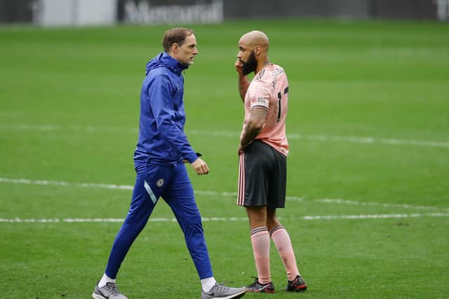 Thomas Tuchel manager of Chelsea passes by disappointed David McGoldrick of Sheffield Utd during the FA Cup match at Stamford Bridge, London. Picture date: 21st March 2021. Picture credit should read: David Klein/Sportimage