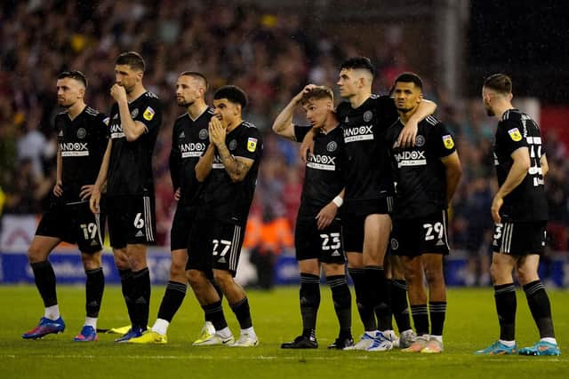 Sheffield United players react during the penalty shoot-out in the Sky Bet Championship play-off semi-final at the City Ground. Mike Egerton/PA Wire.