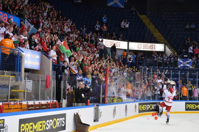 Brandon McNally celebrates with Cardiff Devils fans after last season's final. Picture: James Assinder/Cardiff Devils