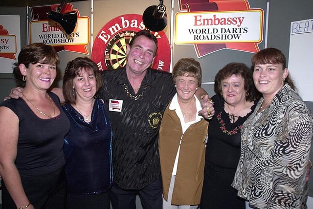 Darts showman Bobby George and some of his fans at the Embassy World Darts Roadshow at the Park & Arbourthorne Club, City Road, Sheffield, October 2002