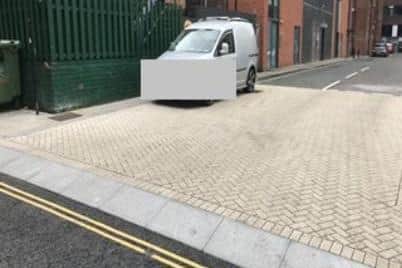 The controversial new junction of Division Lane in Sheffield city centre, showing a van parked on a tactile surface. Councillors rejected plans to enforce no parking near the junction. Picture: Sheffield City Council