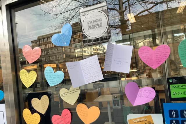 Moving messages left on the doors of John Lewis in Sheffield from shoppers