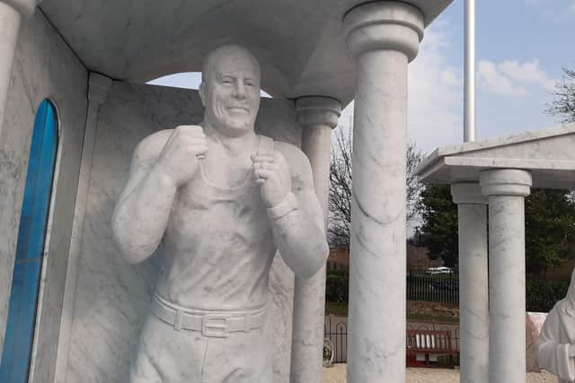 This marble statue at Sheffield's Shiregreen Cemetery depicts Willy Collins as he looked when he was bare-knuckle fighting. It is part of his 37-tonne headstone, which was unveiled in March