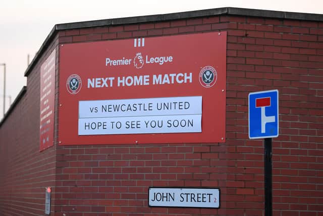 The Bramall Lane fixture board displays the upcoming game along with a 'Hope To See You Soon' sign  (Photo by Stu Forster/Getty Images)