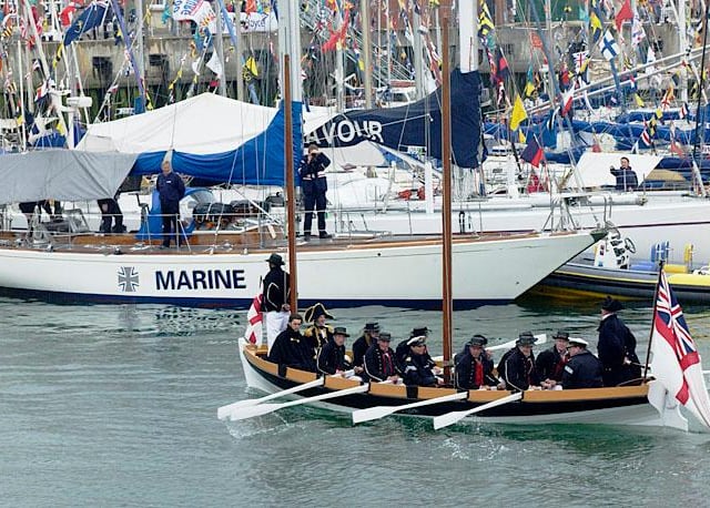 The International Festival of the Sea, Portsmouth Royal Naval Dockyard. Pictured is 2SL, Sir James Burnell-Nugent and his wife taking a trip round the dockyard nelson style.