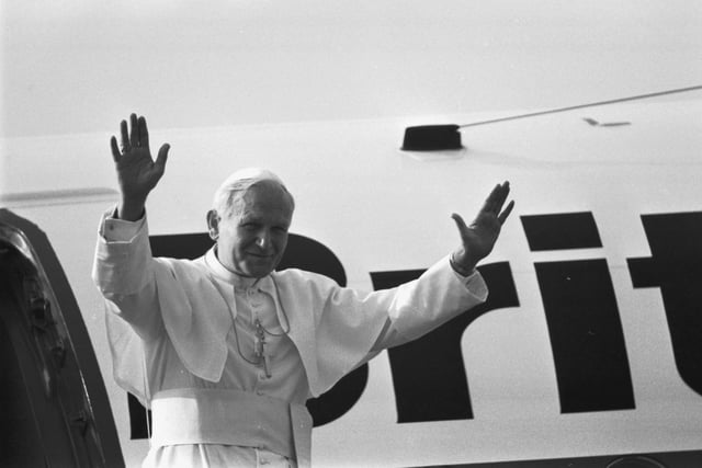 Pope John Paul II waves to the crowd before he boards his helicopter at Turnhouse after the Papal visit to Scotland in May 1982.