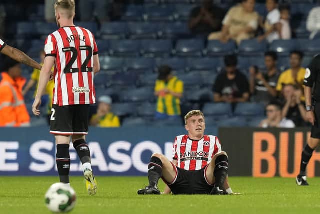 Ben Osborn suffers an injury while on duty for Sheffield United in August: Andrew Yates / Sportimage