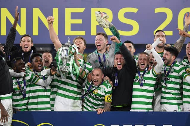 Celtic captain Scott Brown lifts the 2019/2020 Scottish Cup after the penalty shoot-out win over Hearts at Hampden. (Photo by Craig Foy / SNS Group)
