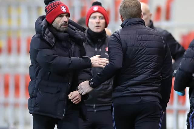 Rotherham United boss Paul Warne (left) said he sympathises with the position Garry Monk is in at Sheffield Wednesday.