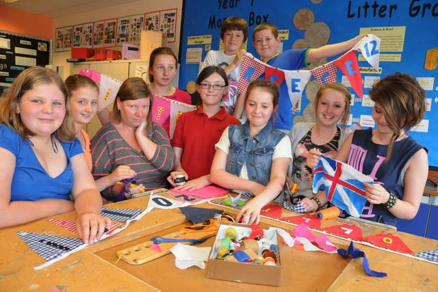 Parents and pupils from Sandhill View School were busy making bunting during a vintage design day in 2012. Is there someone you know in this photo?