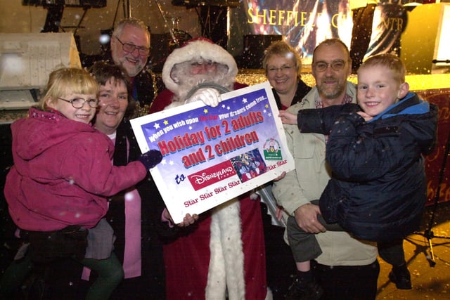 Winners of the Star holiday to Disneyland Paris in 2001. The Frost family, Hannah 4, mum Denise, dad Stuart and Thomas, aged 6. Got their prize from the Lord Mayor and Mayoress of Sheffield and Santa in 2001.