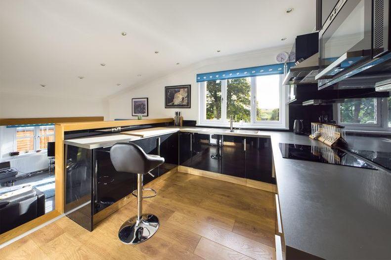 Stylish kitchen has all the mod cons and a great view too, what more could you ask for?