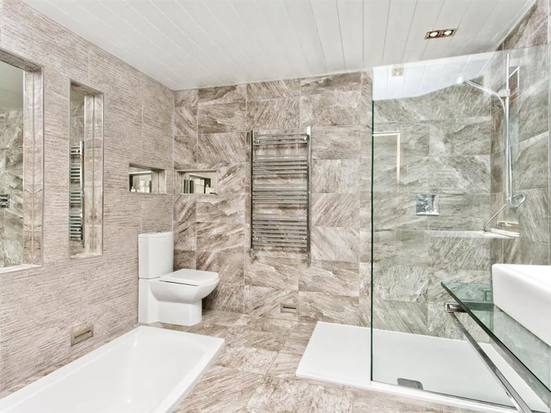 En-suite with sunken bath.