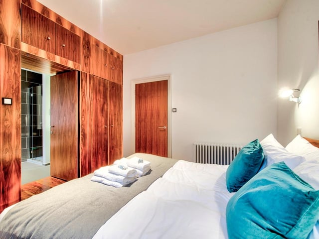 This is one of the flat’s two bedrooms, with both boasting en-suite facilities - no more sharing a bathroom with a messy flatmate, or queuing to use the shower!