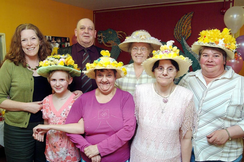 Members of the Mansfield Woodhouse Vale Road Focus Point bingo club show off their Easter bonnets after winning prizes in 2009.  
Judging the competition were councillors Joyce Bosjnak, left, and Derek Birkin.