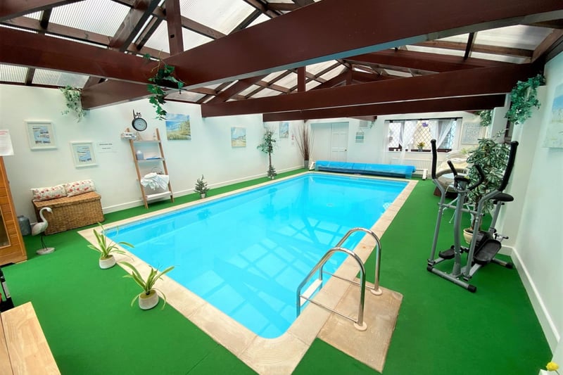 The indoor heated swimming pool.