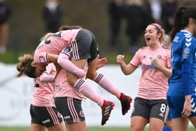 Sheffield United player Courtney Sweetman-Kirk is lifted in the air by team mates after scoring the opeining goal during the FA Women's Championship match between Durham Women and Sheffield United  at Maiden Castle . (Photo by Stu Forster/Getty Images)