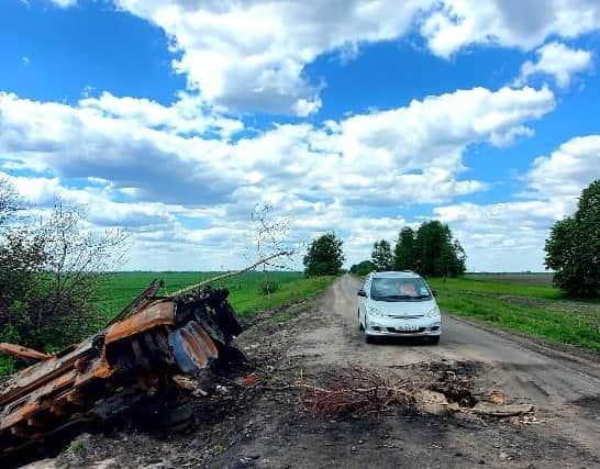 Sergey driving the Toyota car filled with donations around war-torn Ukraine.
