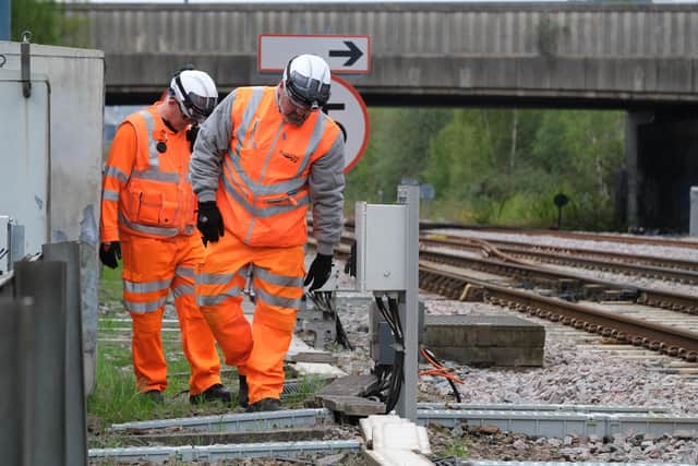 Network Rail and British Transport Police check on signalling cables alonside tracks in Sheffield.. The number of cases of cable thefts across South Yorkshire, which officials say is being hit hardest nationally, has soared this month.
