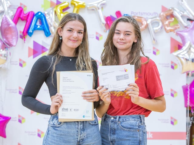 Megan Johnson and Harriet Brown collect their results at Portsmouth College. Picture: Habibur Rahman