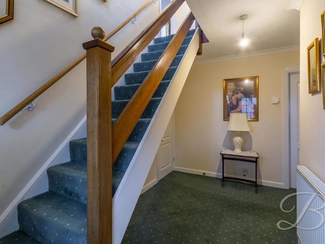 Although the Faraday Road property is classed as a bungalow, the three bedrooms can be found up this short flight of stairs, accessed from the entrance hallway.