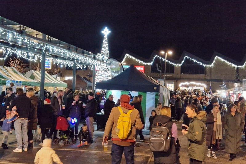 People enjoying the Christmas market at Fox Valley after the switch-on
