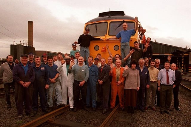 Pictured is the last locomotive to leave the Tinsley Marshalling Yard on Wood Lane, with all the staff of the yard, March 27, 1998