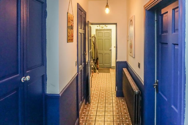 The entrance hall is tiled and is a stylish introduction to the house.