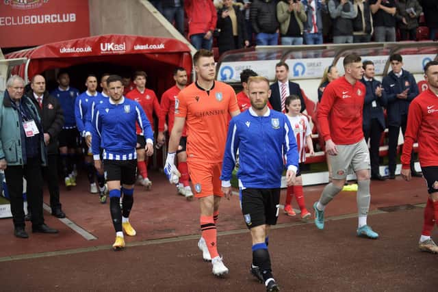 Barry Bannan leads his team out at the Stadium of Light in the pla-off semi-final first leg against Sunderland   Pic Steve Ellis